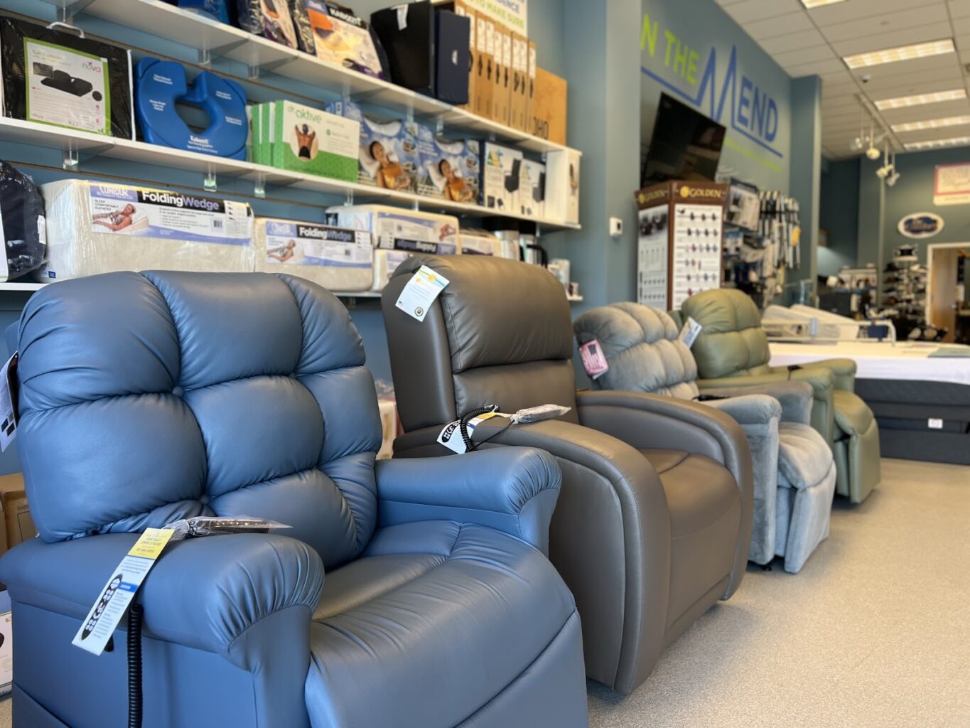 A view of four lift and recline chairs at On The Mend Medical.